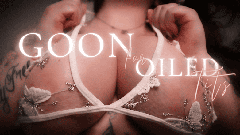 adela divine's thumbnail for femdom pov clip goon for oiled tits. themes gooning, tit worship, oil fetish